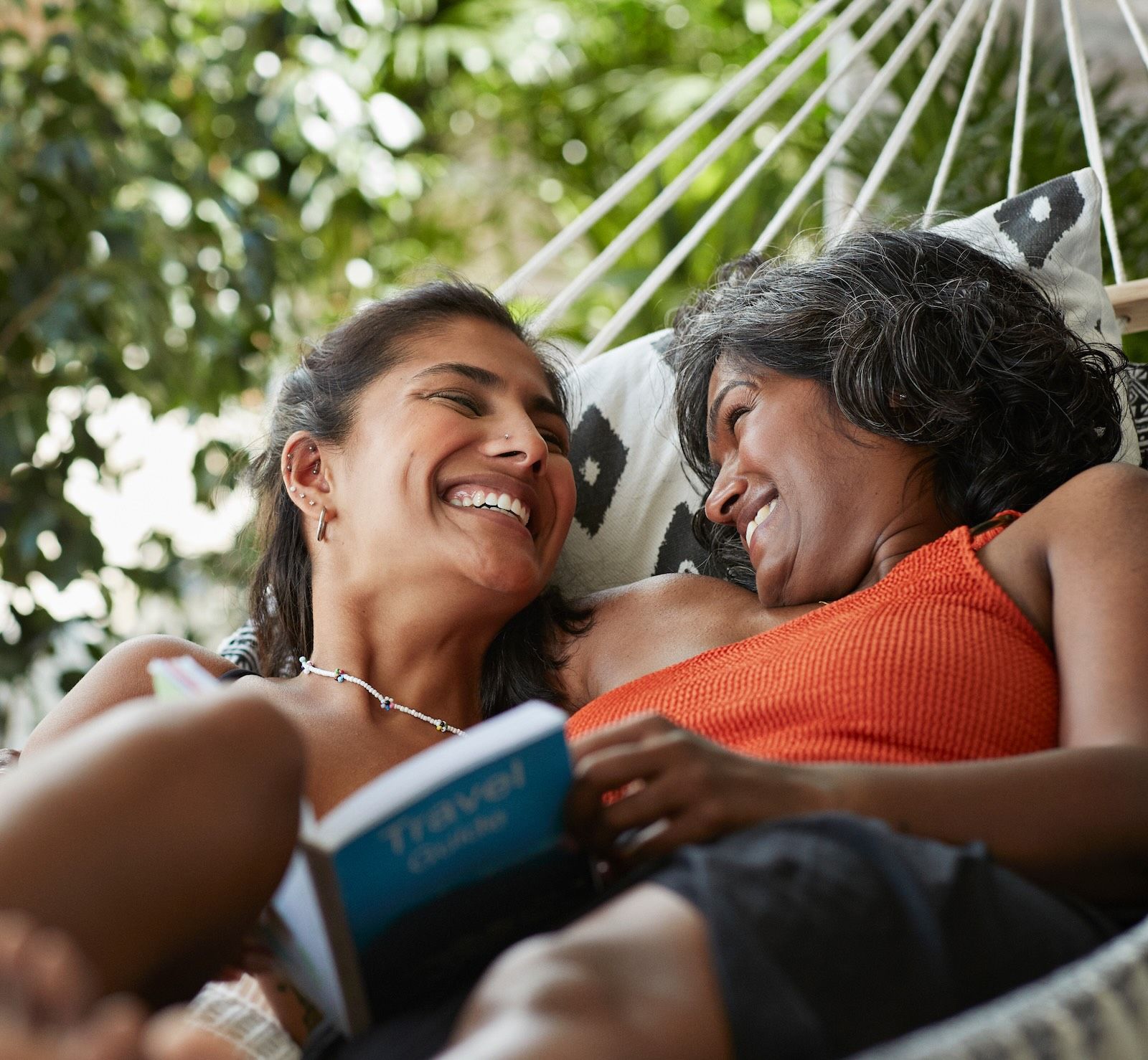 Two people relaxing and reading together